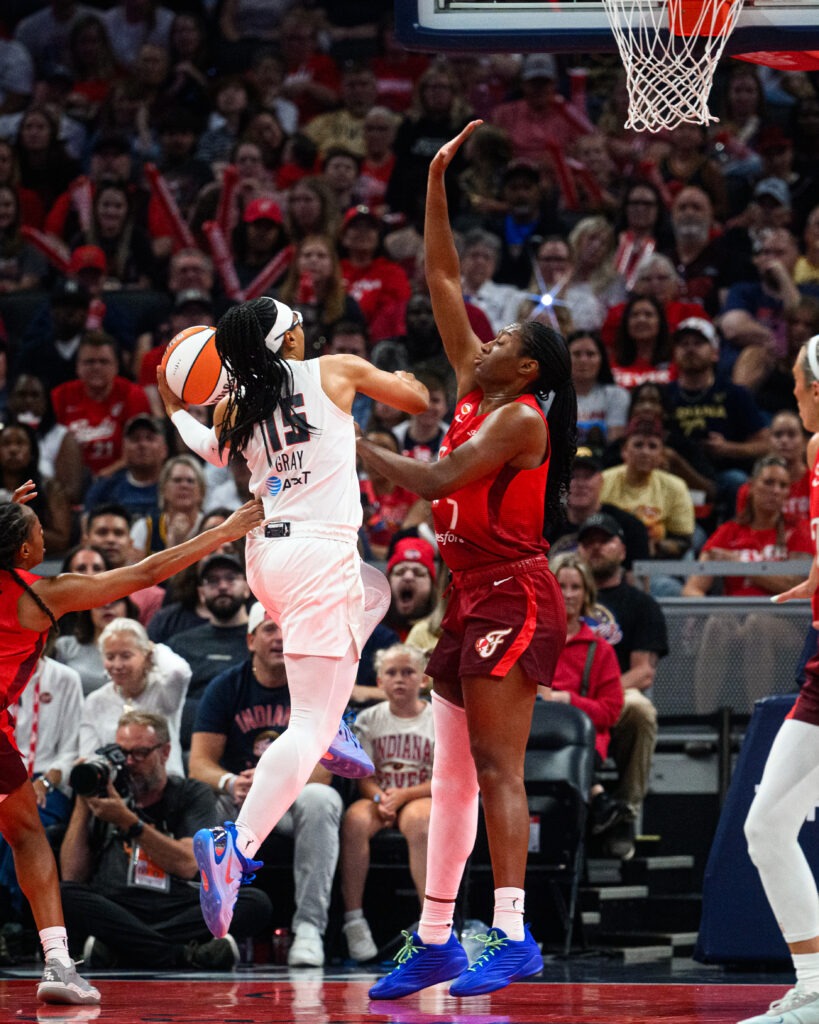 Allisha Gray drives to basket 