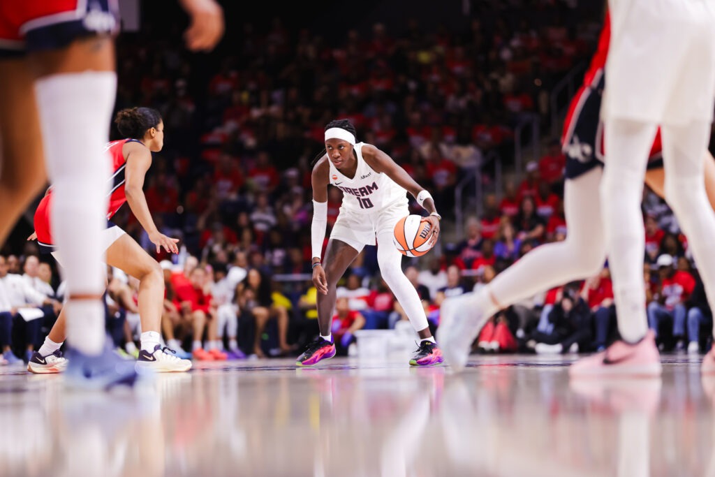 Fourth-Quarter Surge Powers Dream Past Mystics and Into WNBA Semifinals 3 Rhyne Howard looks for a gap in the defense 2414
